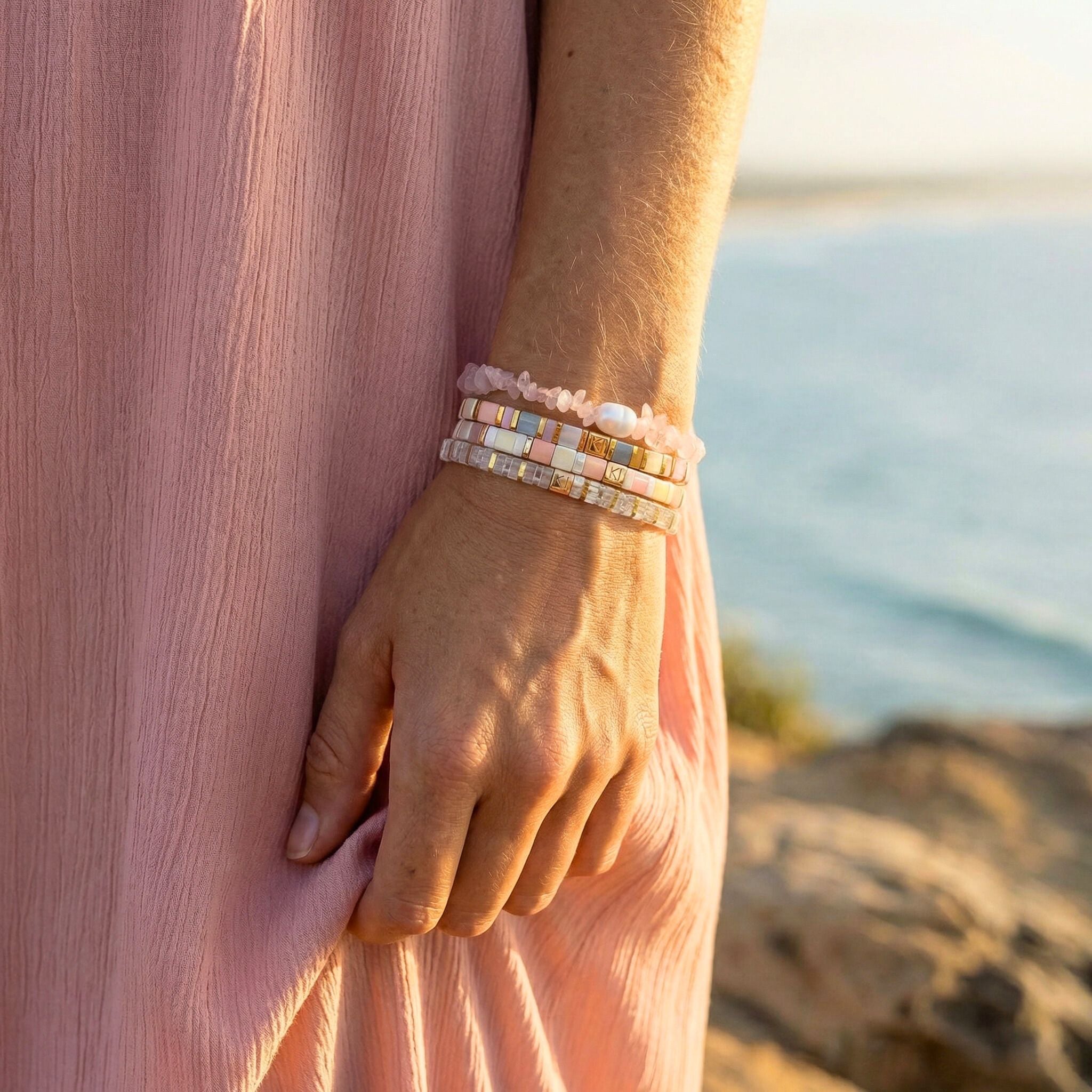 Person wearing a bracelet with a scenic background