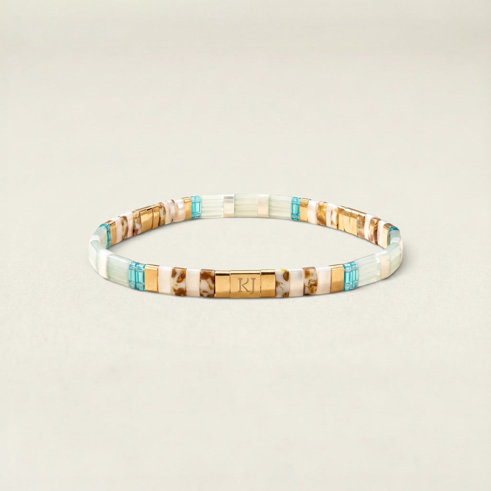 Multicolored beaded bracelet on a beige background