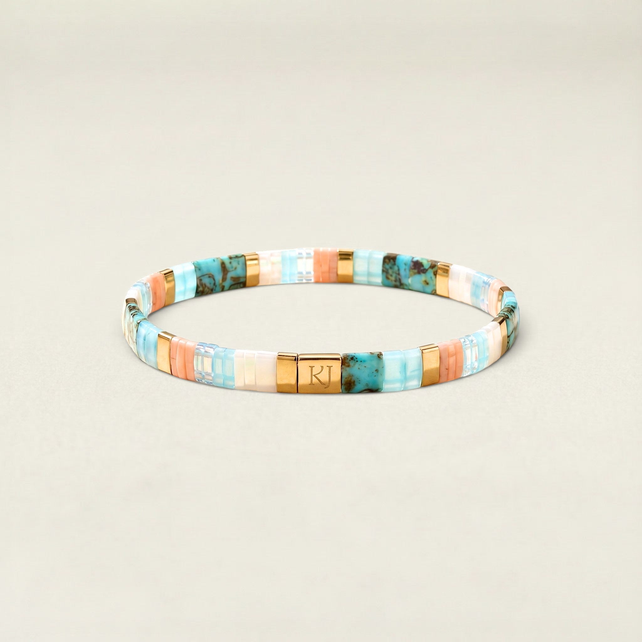 Multicolored beaded bracelet on a beige background