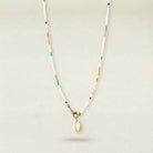 Necklace with a shell pendant on a light gray background